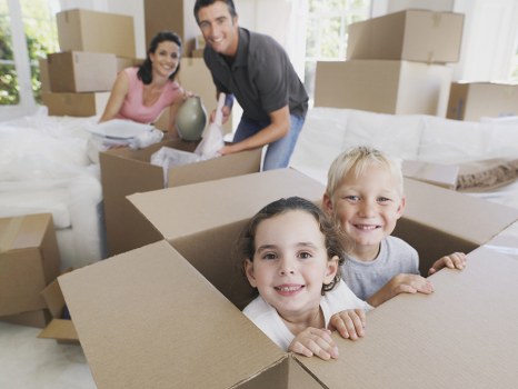 Moving van and household boxes ready for a home move in Kenton