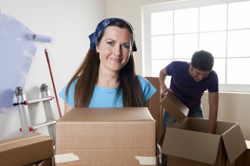 Packing and loading belongings into a moving truck in Kenton