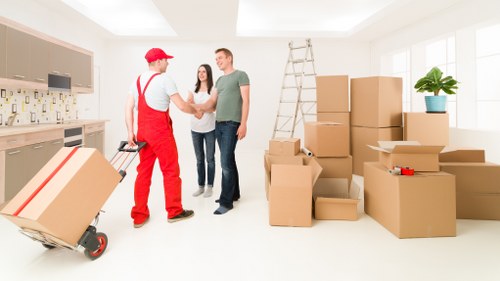 Professional moving van team handling a residential relocation in Kenton