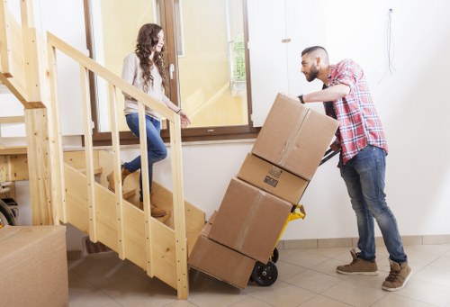 Packed boxes and furniture ready for a house removal in Kenton