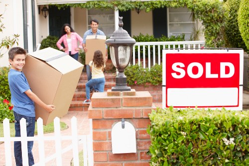 Commercial office moving team handling furniture and equipment